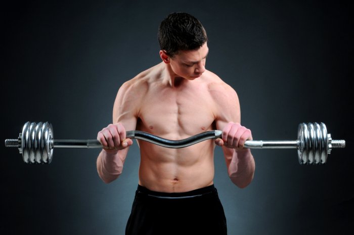 Reverse barbell curls place more of the emphasis on the brachialis and Brachioradialis